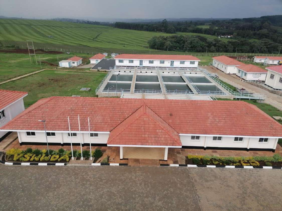 Water treatment works with settling tanks and plant buildings